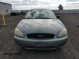 2006 Ford Taurus SE z VIN 1FAFP53U76A109890, wystawiony jako Copart lot #57135575 z przebiegiem 160 750 mil mil oraz Szkoda całkowita • Salvage title. Historia ofert i sprzedaży dostępna na DreamBid. Obrazek 5.