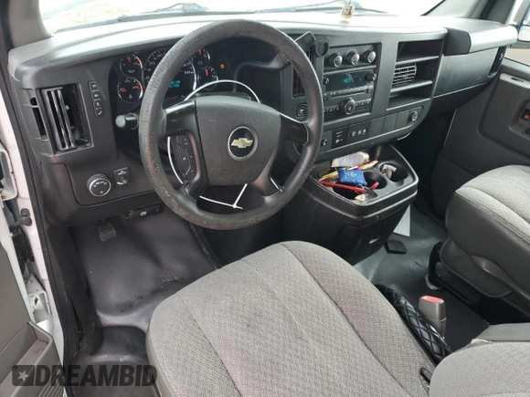 2014 Chevrolet Express Passenger LT z VIN 1GAZG1FG2E1154233, wystawiony jako Copart lot #63480385 z przebiegiem Nie podano mil oraz Nie do naprawy • Non repairable. Historia ofert i sprzedaży dostępna na DreamBid. Obrazek 8.