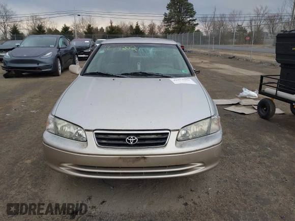 2001 Toyota Camry CE with VIN 4T1BG22K51U046766, listed as a IAAI auction lot 41674202 with 148,581 mi miles. Bid and sale history available at carsss.com. Image 12.
