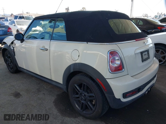 2014 MINI Convertible S with VIN WMWZP3C5XET706911, listed as a IAAI auction lot 42217410 with 54,649 mi miles and . Bid and sale history available at DreamBid. Image 3.