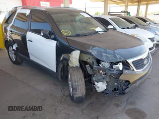 2012 Kia Sorento LX with VIN 5XYKT4A21CG242866, listed as a IAAI auction lot 42172159 with 217,651 mi miles. Bid and sale history available at carsss.com. Image 1.