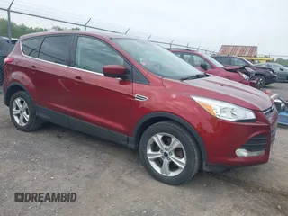 2014 Ford Escape SE z VIN 1FMCU9GX0EUD90716, wystawiony jako IAAI lot #42242482 z przebiegiem 117 806 mil mil oraz . Historia ofert i sprzedaży dostępna na DreamBid. Obrazek 1.