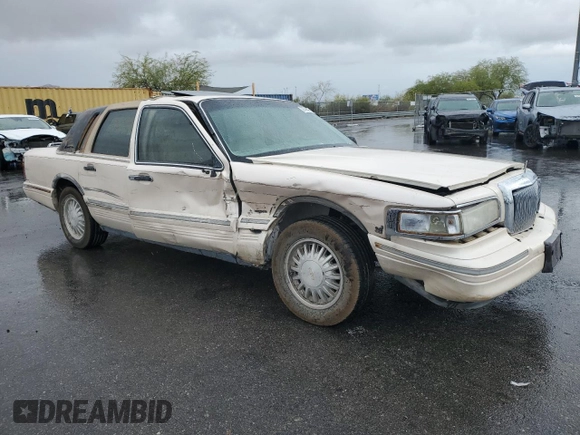 1995 Lincoln Town Car Cartier z VIN 1LNLM83W2SY603452, wystawiony jako Copart lot #55756595 z przebiegiem 243 394 mil mil oraz Szkoda całkowita • Salvage title. Historia ofert i sprzedaży dostępna na DreamBid. Obrazek 4.