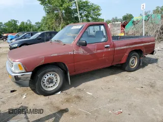 1991 Toyota Pickup DX z VIN JT4RN81P9M5115899, wystawiony jako Copart lot #60086765 z przebiegiem 32 049 mil mil oraz Czysty tytuł • Clean title. Historia ofert i sprzedaży dostępna na DreamBid. Obrazek 1.