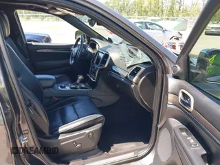 2017 Jeep Grand Cherokee Overland with VIN 1C4RJFCG2HC641791, listed as a IAAI auction lot 42566654 with 116,764 mi miles and . Bid and sale history available at DreamBid. Image 5.