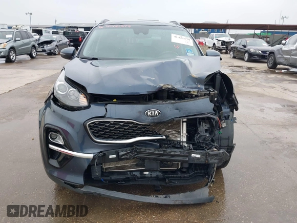 2021 Kia Sportage EX with VIN KNDPN3AC7M7920408, listed as a IAAI auction lot 41421579 with 70,921 mi miles and . Bid and sale history available at DreamBid. Image 13.