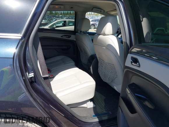 2015 Cadillac SRX with VIN 3GYFNAE39FS571065, listed as a IAAI auction lot 42029749 with 146,098 mi miles and . Bid and sale history available at DreamBid. Image 8.