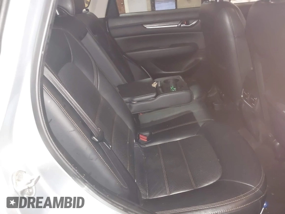 2021 Mazda CX-5 Grand Touring with VIN JM3KFADMXM1318015, listed as a IAAI auction lot 41221528 with 79,473 mi miles. Bid and sale history available at carsss.com. Image 8.