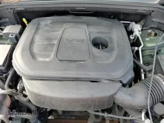 2019 Jeep Grand Cherokee Trailhawk with VIN 1C4RJFLG1KC738049, listed as a Copart auction lot 64312375 with 64,562 mi miles and Salvage title. Bid and sale history available at DreamBid. Image 14.