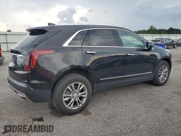 2023 Cadillac XT5 AWD Premium Luxury with VIN 1GYKNDRSXPZ145763, listed as a Copart auction lot 58387365 with 51,368 mi miles and Salvage title. Bid and sale history available at DreamBid. Image 3.