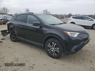 2016 Toyota RAV4 LE with VIN 2T3BFREV2GW454983, listed as a Copart auction lot 49323025 with 183,910 mi miles and Salvage Title. Bid and sale history available at DreamBid. Image 4.
