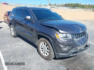 2016 Jeep Grand Cherokee Laredo z VIN 1C4RJEAG0GC390992, wystawiony jako IAAI lot #41626823 z przebiegiem 115 870 mil mil oraz . Historia ofert i sprzedaży dostępna na DreamBid. Obrazek 1.