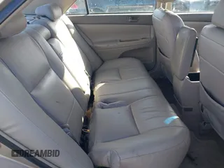 2002 Toyota Camry XLE z VIN 4T1BF32KX2U034414, wystawiony jako IAAI lot #42281225 z przebiegiem 141 434 mil mil oraz . Historia ofert i sprzedaży dostępna na DreamBid. Obrazek 8.