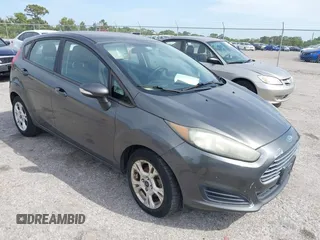 2016 Ford Fiesta SE with VIN 3FADP4EJ4GM129006, listed as a IAAI auction lot 42085892 with 146,044 mi miles. Bid and sale history available at carsss.com. Image 1.