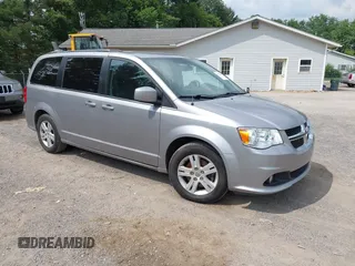 2018 Dodge Grand Caravan SXT z VIN 2C4RDGCG9JR250129, wystawiony jako IAAI lot #42735883 z przebiegiem 98 605 mil mil oraz . Historia ofert i sprzedaży dostępna na DreamBid. Obrazek 1.