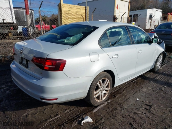 2017 Volkswagen Jetta 1.4T S with VIN 3VW167AJ9HM215563, listed as a IAAI auction lot 41473283 with 119,648 mi miles. Bid and sale history available at carsss.com. Image 4.