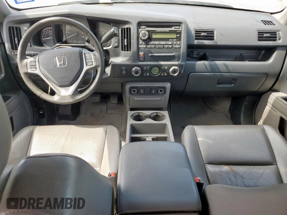 2014 Honda Ridgeline RTL z VIN 5FPYK1F53EB004694, wystawiony jako Copart lot #57222085 z przebiegiem 128 210 mil mil oraz Szkoda całkowita • Salvage title. Historia ofert i sprzedaży dostępna na DreamBid. Obrazek 8.