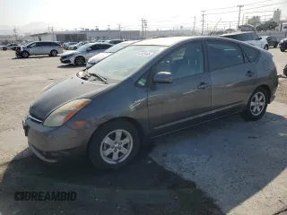 2007 Toyota Prius with VIN JTDKB20U973219730, listed as a Copart auction lot 62429165 with 176,424 mi miles and Salvage title. Bid and sale history available at DreamBid. Image 1.