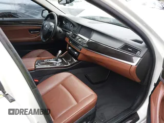 2013 BMW 5 Series 528i xDrive with VIN WBAXH5C54DDW13438, listed as a IAAI auction lot 41851954 with 122,653 mi miles. Bid and sale history available at carsss.com. Image 5.