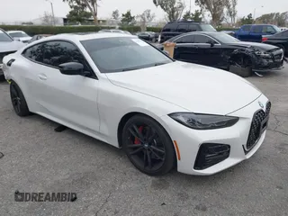 2022 BMW 4 Series 430i with VIN WBA53AP02NCK91287, listed as a IAAI auction lot 41448686 with 27,046 mi miles and . Bid and sale history available at carsss.com. Image 1.