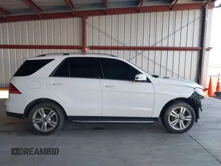 2016 Mercedes-Benz GLE 350 with VIN 4JGDA5JBXGA710342, listed as a IAAI auction lot 41012189 with 128,325 mi miles and . Bid and sale history available at DreamBid. Image 14.