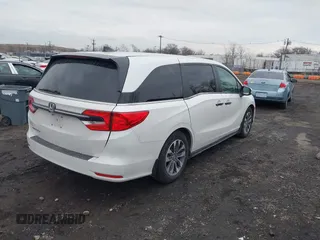2023 Honda Odyssey EX-L with VIN 5FNRL6H64PB057372, listed as a IAAI auction lot 41306641 with 133,803 mi miles. Bid and sale history available at carsss.com. Image 4.
