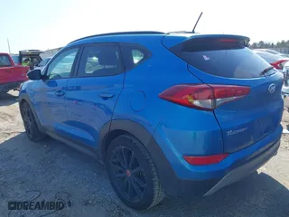 2017 Hyundai Tucson Value with VIN KM8J33A2XHU467861, listed as a IAAI auction lot 41684522 with 96,841 mi miles. Bid and sale history available at carsss.com. Image 3.