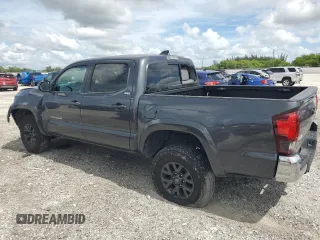 2023 Toyota Tacoma SR with VIN 3TMCZ5AN6PM571686, listed as a Copart auction lot 60260095 with 29,687 mi miles and Non repairable. Bid and sale history available at DreamBid. Image 2.