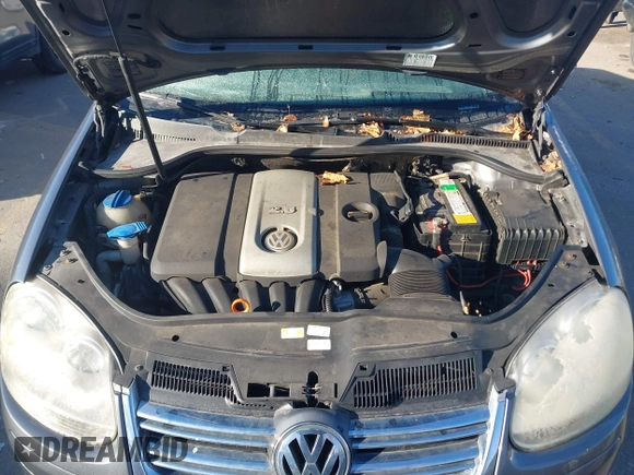 2007 Volkswagen Jetta z VIN 3VWJF71K97M021624, wystawiony jako IAAI lot #41682214 z przebiegiem Nie podano mil oraz . Historia ofert i sprzedaży dostępna na DreamBid. Obrazek 10.