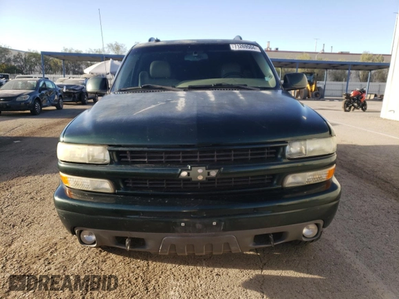 2003 Chevrolet Tahoe Z71 with VIN 1GNEK13TX3R172104, listed as a Copart auction lot 71269504 with 163,168 mi miles and Salvage Title. Bid and sale history available at carsss.com. Image 5.