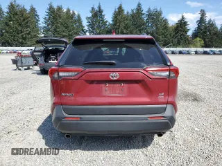 2019 Toyota RAV4 LE with VIN JTMG1RFV4KJ016086, listed as a Copart auction lot 55631155 with 60,604 mi miles and Salvage Title. Bid and sale history available at DreamBid. Image 6.