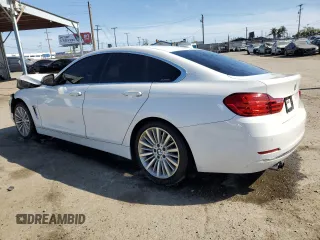 2015 BMW 4 Series 428i with VIN WBA4A9C58FGL85220, listed as a Copart auction lot 57128265 with 115,257 mi miles and Salvage title. Bid and sale history available at DreamBid. Image 2.