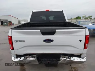 2015 Ford F-150 XLT with VIN 1FTEW1EP7FKE61564, listed as a IAAI auction lot 41889545 with 152,057 mi miles. Bid and sale history available at carsss.com. Image 6.