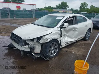2012 Buick LaCrosse Premium 2 with VIN 1G4GF5E38CF218939, listed as a IAAI auction lot 42522959 with 210,719 mi miles and . Bid and sale history available at DreamBid. Image 2.