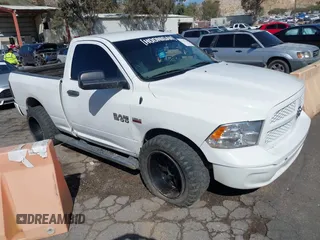 2015 Ram 1500 Tradesman z VIN 3C6JR6ATXFG643621, wystawiony jako IAAI lot #41718128 z przebiegiem 64 795 mil mil oraz . Historia ofert i sprzedaży dostępna na DreamBid. Obrazek 1.