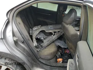2018 Toyota Camry LE с VIN 4T1B11HK6JU573623, выставлен на аукционе Copart как лот 61994865 с пробегом Не указан миль и Списание • Salvage title. История ставок и продаж доступна на DreamBid. Изображение 10.