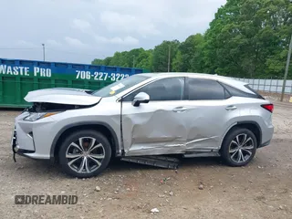 2016 Lexus RX 350 z VIN 2T2ZZMCA5GC002315, wystawiony jako IAAI lot #42107312 z przebiegiem 156 339 mil mil oraz . Historia ofert i sprzedaży dostępna na DreamBid. Obrazek 15.