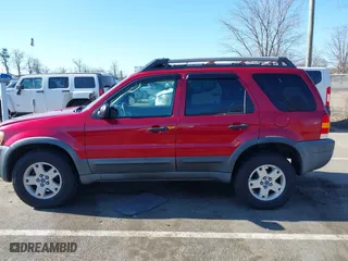 2003 Ford Escape XLT Popular 2 with VIN 1FMCU93183KC65571, listed as a IAAI auction lot 41768982 with 150,658 mi miles. Bid and sale history available at carsss.com. Image 14.