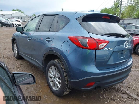 2016 Mazda CX-5 Touring z VIN JM3KE2CY3G0728968, wystawiony jako IAAI lot #42189174 z przebiegiem 145 977 mil mil oraz . Historia ofert i sprzedaży dostępna na DreamBid. Obrazek 3.