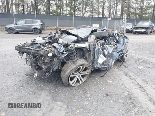 2011 Volkswagen Tiguan SE with VIN WVGBV7AX7BW500103, listed as a IAAI auction lot 38710892 with 105,000 mi miles and . Bid and sale history available at DreamBid. Image 2.