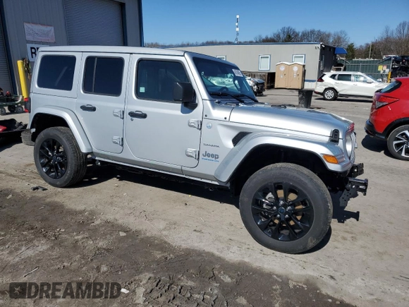 2024 Jeep Wrangler Sahara with VIN 1C4RJXP63RW195206, listed as a Copart auction lot 48784595 with 10,737 mi miles and Salvage Title. Bid and sale history available at DreamBid. Image 4.
