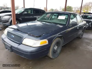 2001 Ford Crown Victoria Police Pkg Police Interceptor with VIN 2FAFP71WX1X127347, listed as a IAAI auction lot 41134745 with 161,180 mi miles. Bid and sale history available at carsss.com. Image 17.