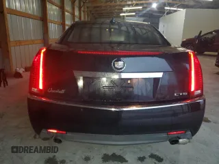 2009 Cadillac CTS RWD с VIN 1G6DF577590169740, выставлен на аукционе Copart как лот 57041055 с пробегом 68 857 миль миль и Списание • Salvage title. История ставок и продаж доступна на DreamBid. Изображение 6.