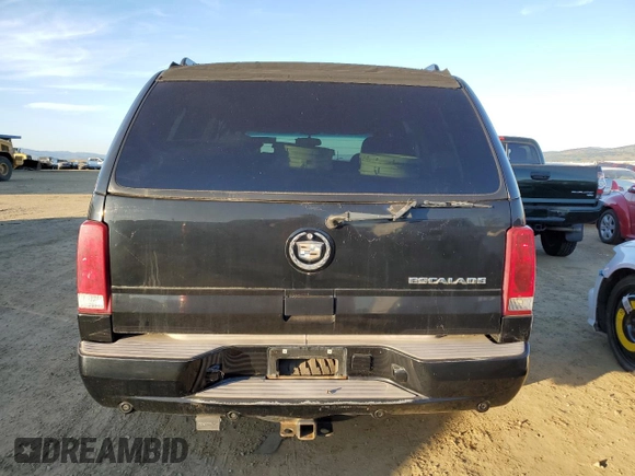 2003 Cadillac Escalade z VIN 1GYEC63TX3R135227, wystawiony jako Copart lot #88373245 z przebiegiem 258 595 mil mil oraz Czysty tytuł • Clean title. Historia ofert i sprzedaży dostępna na DreamBid. Obrazek 6.