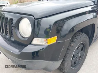2015 Jeep Patriot Sport with VIN 1C4NJRBB3FD130331, listed as a IAAI auction lot 42075524 with 180,719 mi miles and . Bid and sale history available at carsss.com. Image 14.