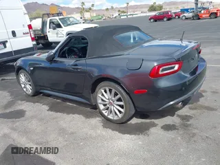 2018 FIAT 124 Spider Classica z VIN JC1NFAEK3J0137856, wystawiony jako IAAI lot #41959793 z przebiegiem 49 513 mil mil oraz . Historia ofert i sprzedaży dostępna na DreamBid. Obrazek 3.