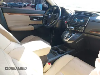 2017 Honda CR-V Touring with VIN 5J6RW2H94HL013536, listed as a IAAI auction lot 41577317 with 97,132 mi miles. Bid and sale history available at carsss.com. Image 5.