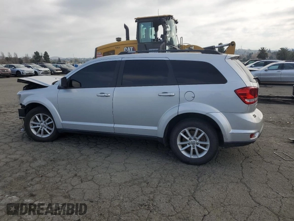 2014 Dodge Journey SXT with VIN 3C4PDCBG5ET227189, listed as a Copart auction lot 88994355 with 166,989 mi miles and Salvage Title. Bid and sale history available at carsss.com. Image 2.
