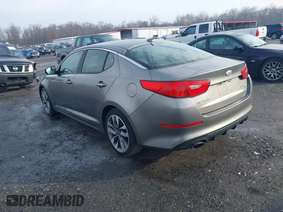 2014 Kia Optima SX Turbo with VIN 5XXGR4A64EG286133, listed as a IAAI auction lot 41489575 with 68,573 mi miles and . Bid and sale history available at DreamBid. Image 3.