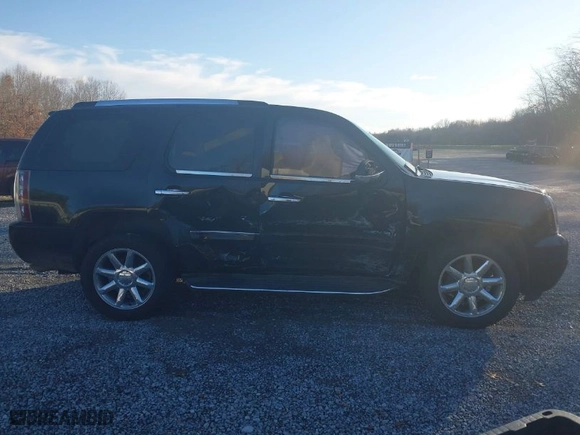 2008 GMC Yukon Denali with VIN 1GKFK63858J134120, listed as a IAAI auction lot 41126138 with 161,794 mi miles. Bid and sale history available at carsss.com. Image 13.